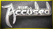 ACCUSED METAL BADGE